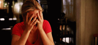 Woman In Red Shirt Covering Face GIF