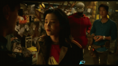 Woman In Red Shirt Looking Up GIF
