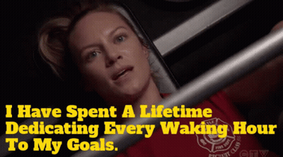 Woman In Red Shirt Lying In Hospital Bed GIF