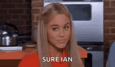 Woman In Red Shirt Making Funny Face GIF