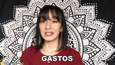 Woman In Red Shirt Saying Gastos GIF
