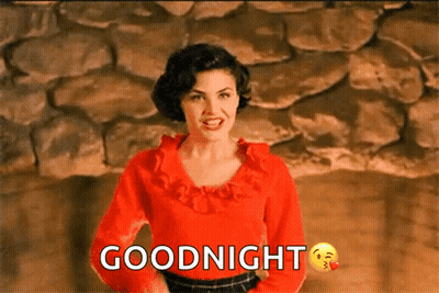 Woman In Red Shirt Saying Goodnight GIF
