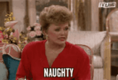 Woman In Red Shirt Saying Naughty GIF