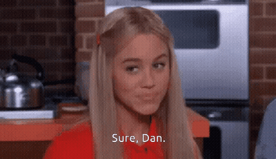 Woman In Red Shirt Saying Sure Dan GIF
