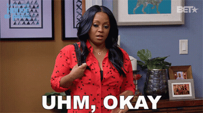 Woman In Red Shirt Saying Uhm Okay GIF