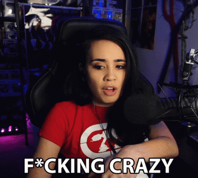 Woman In Red Shirt Sitting At Microphone Saying F Cking Crazy GIF