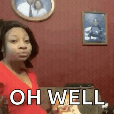 Woman In Red Shirt Sitting On Couch With Couple Picture GIF