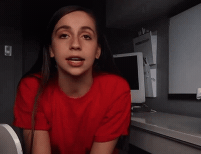 Woman In Red Shirt Sitting On Toilet GIF
