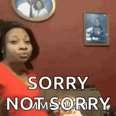 Woman In Red Shirt Standing Before Wall With Couple Picture GIF