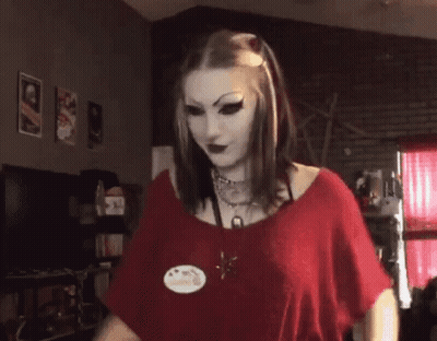 Woman In Red Shirt With I Love You Badge GIF