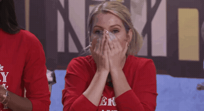 Woman In Red Shirt With Letter Y Covering Mouth GIF