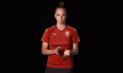 Woman In Red Shirt With Shield GIF