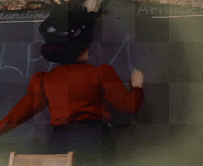 Woman In Red Shirt Writing Arithmetic On Blackboard GIF