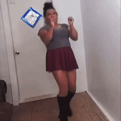 Woman In Red Skirt And Black Boots Dancing GIF