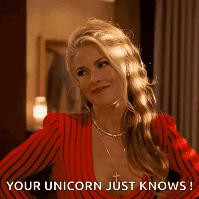 Woman In Red Striped Dress Says Your Unicorn Just Knows GIF