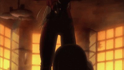 Woman In Red Suit Standing Next To Man GIF