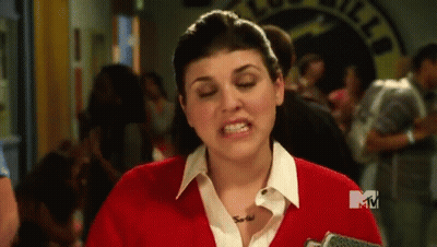 Woman In Red Sweater And M Necklace GIF