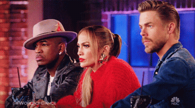 Woman In Red Sweater Between Two Men In Hats On World Of Dance GIF