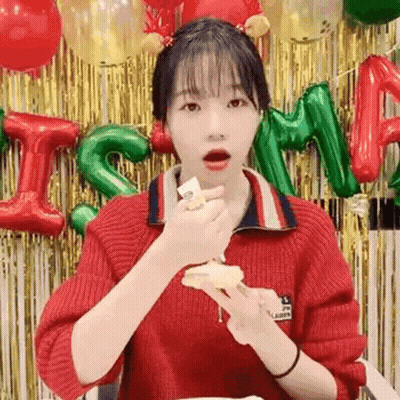 Woman In Red Sweater Eating Cake GIF
