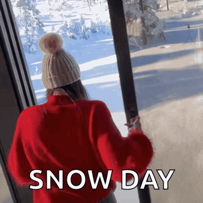 Woman In Red Sweater Looking Out Snow Day GIF