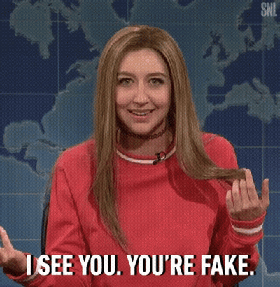 Woman In Red Sweater Saying I See You You're Fake GIF