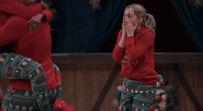 Woman In Red Sweater Saying Merry Christmas GIF