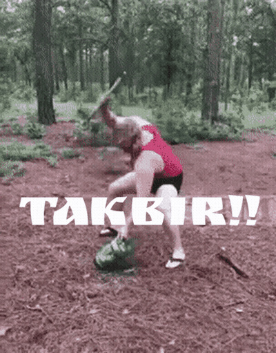 Woman In Red Tank Top Standing In Woods With Takbir GIF