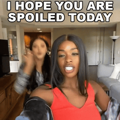 Woman In Red Tank Top Taking Selfie Says I Hope You Are Spoiled Today GIF