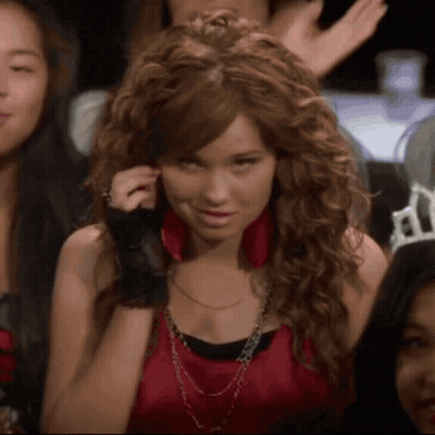Woman In Red Top And Black Glove GIF