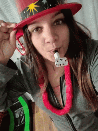 Woman In Red Top Hat With Star Blowing Horn GIF