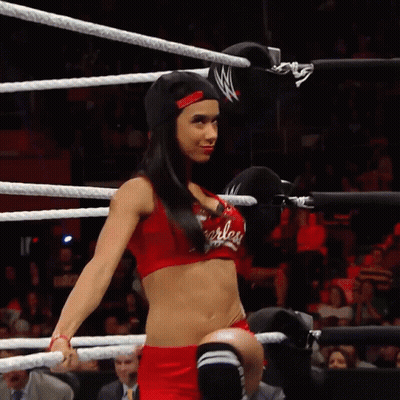Woman In Red Top Saying Fearless In Wrestling Ring GIF