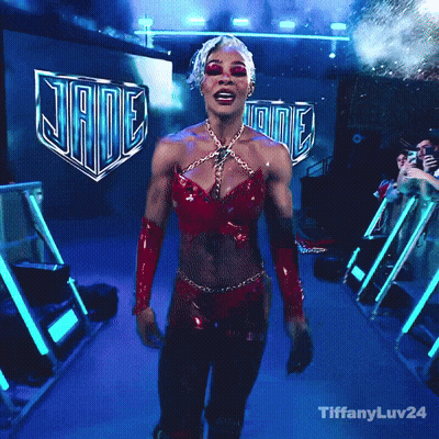 Woman In Red Top Walking Past Jade Sign GIF