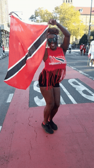 Woman In Red Trinidad Shirt GIF