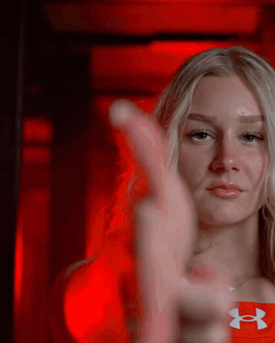 Woman In Red Under Armour Shirt Thumbs Up GIF