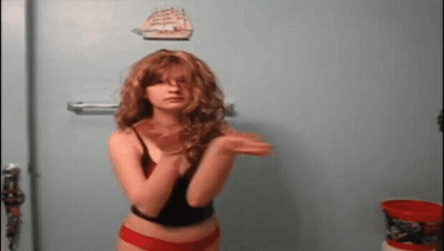 Woman In Red Underwear By Blue Wall With Boat GIF