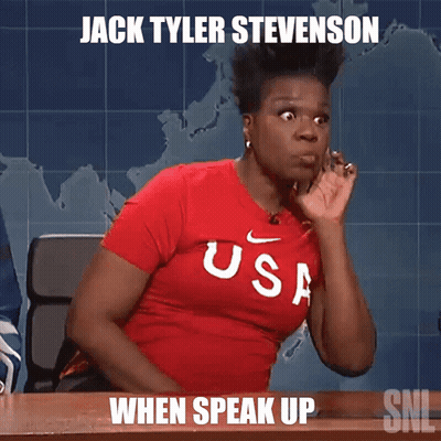 Woman In Red USA Shirt Sitting At Desk GIF