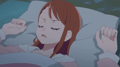 Woman In Red-White Dress Staring At Camera GIF