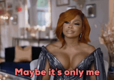 Woman In Revealing Dress Saying Maybe It's Only Me GIF