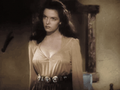 Woman In Revealing Top And Belt With Letter E GIF