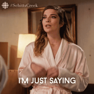 Woman In Robe Saying I'm Just Saying GIF