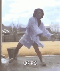 Woman In Robe Slipping On Ice Moment GIF