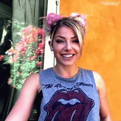 Woman In Rolling Stones Tank Top Smiling GIF