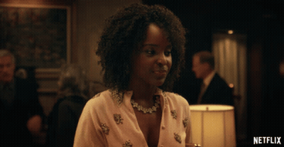 Woman In Room With Netflix Logo GIF