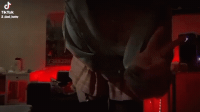 Woman In Room With Red Lights GIF