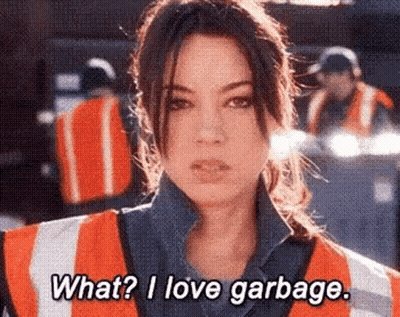 Woman In Safety Vest Asking What I Love Garbage GIF