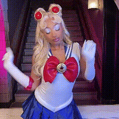 Woman In Sailor Moon Costume By Stairs GIF