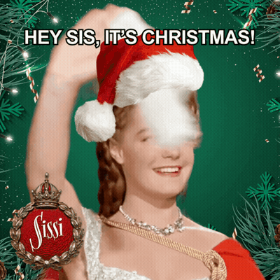 Woman In Santa Hat Saying Hey Sis It's Christmas GIF