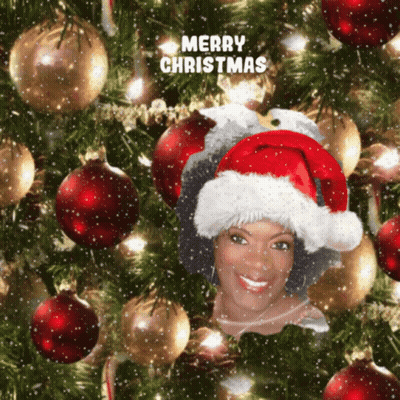 Woman In Santa Hat Saying Merry Christmas GIF