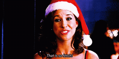 Woman In Santa Hat Saying That Is So Fetch GIF