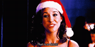 Woman In Santa Hat Saying That Is So Fetch GIF